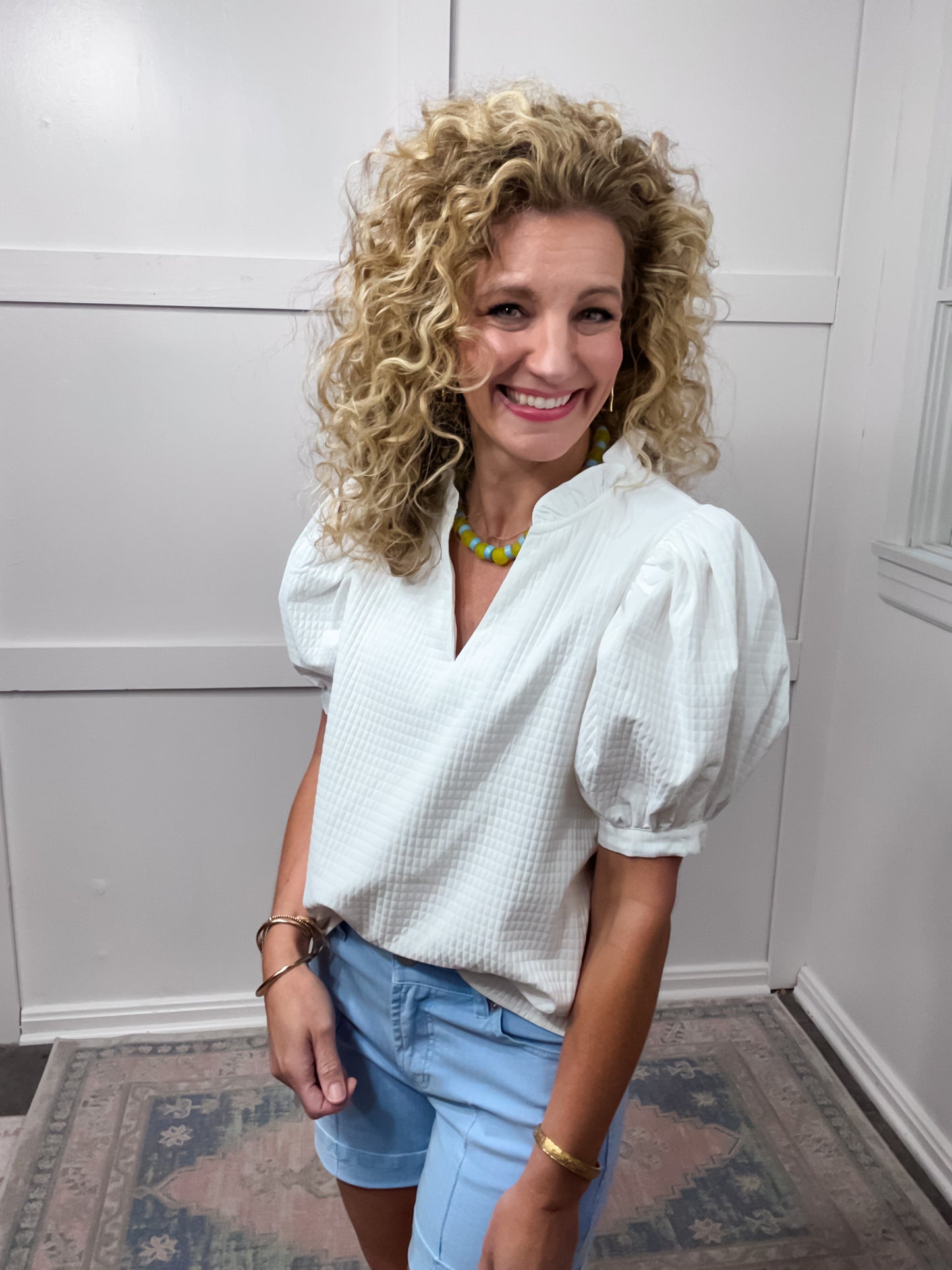 White quilted pattern blouse