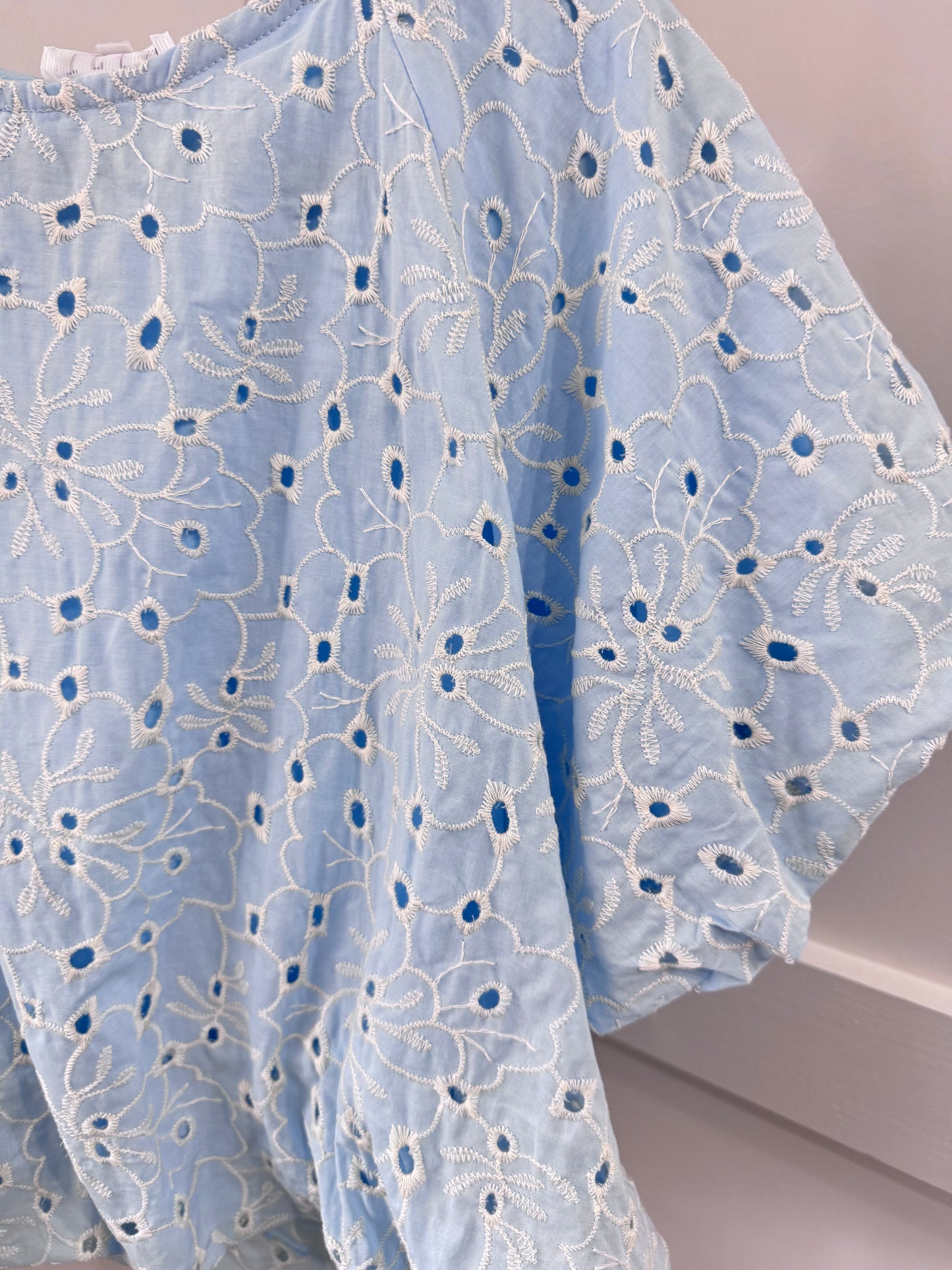 Baby blue eyelet top
