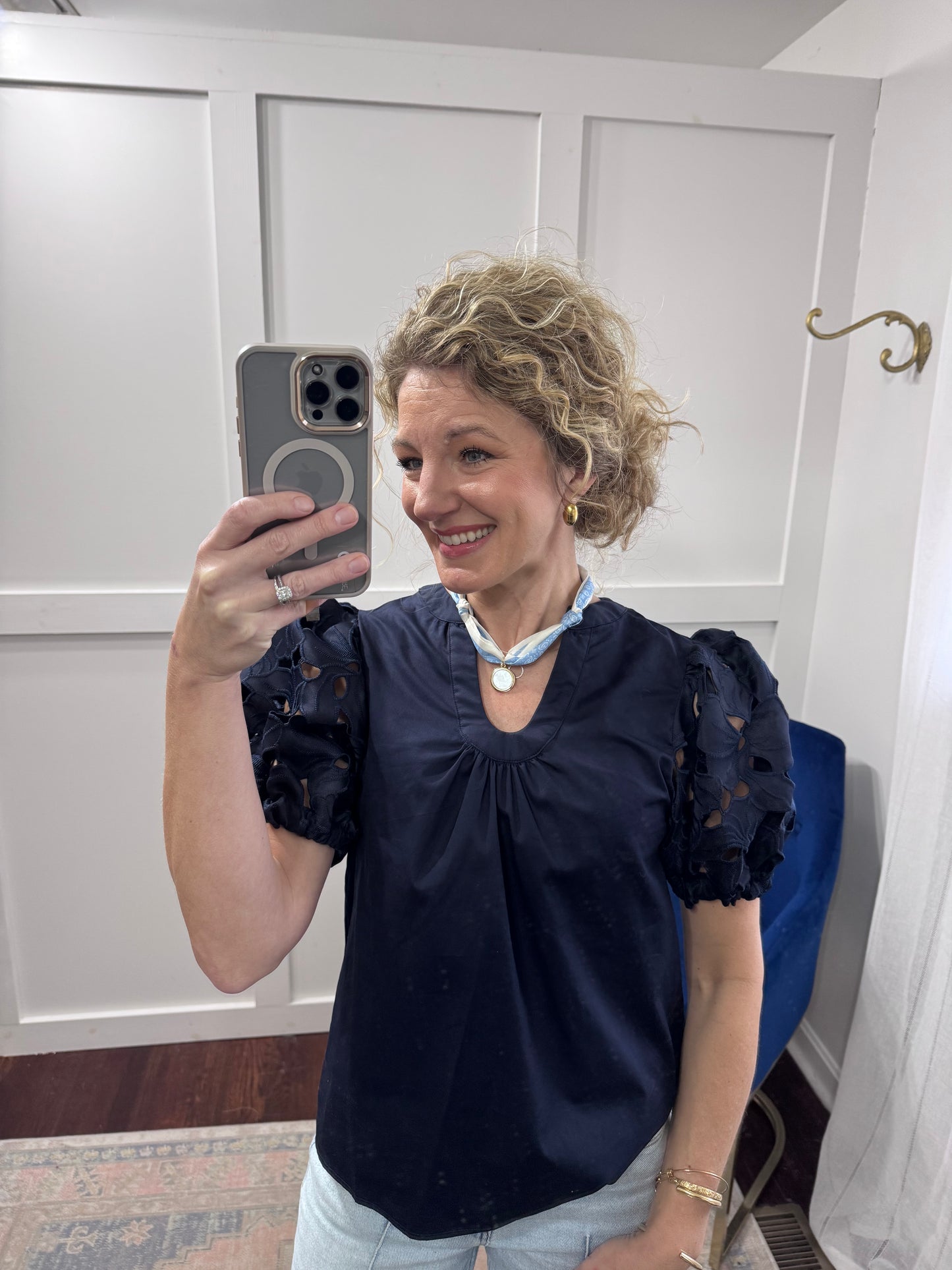 Navy eyelet puff sleeve blouse