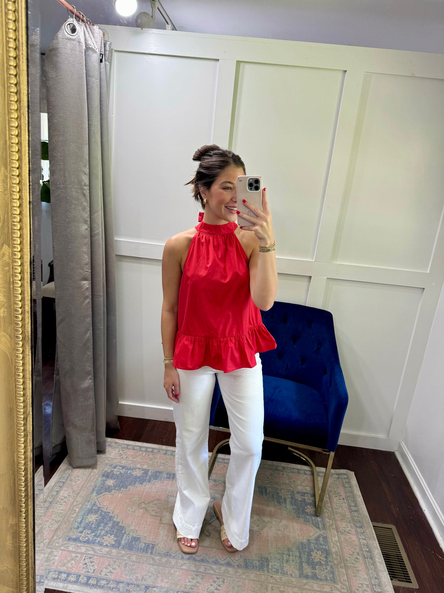 Red halter back bow top