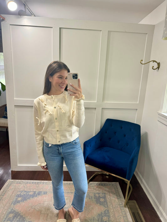 Ivory bow cardigan sweater