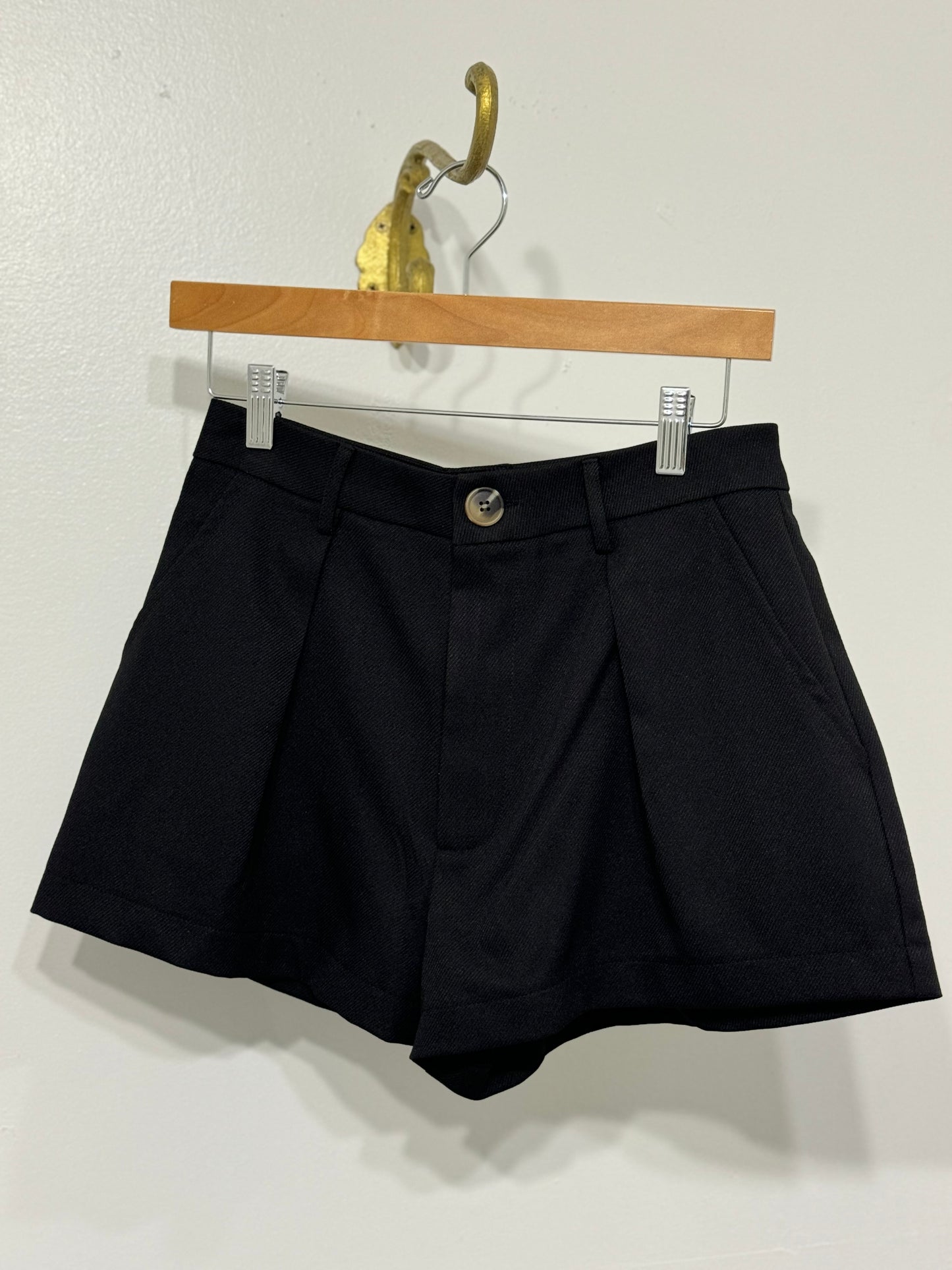 Black midrise pleated shorts