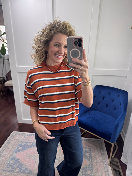 Navy and orange striped sweater