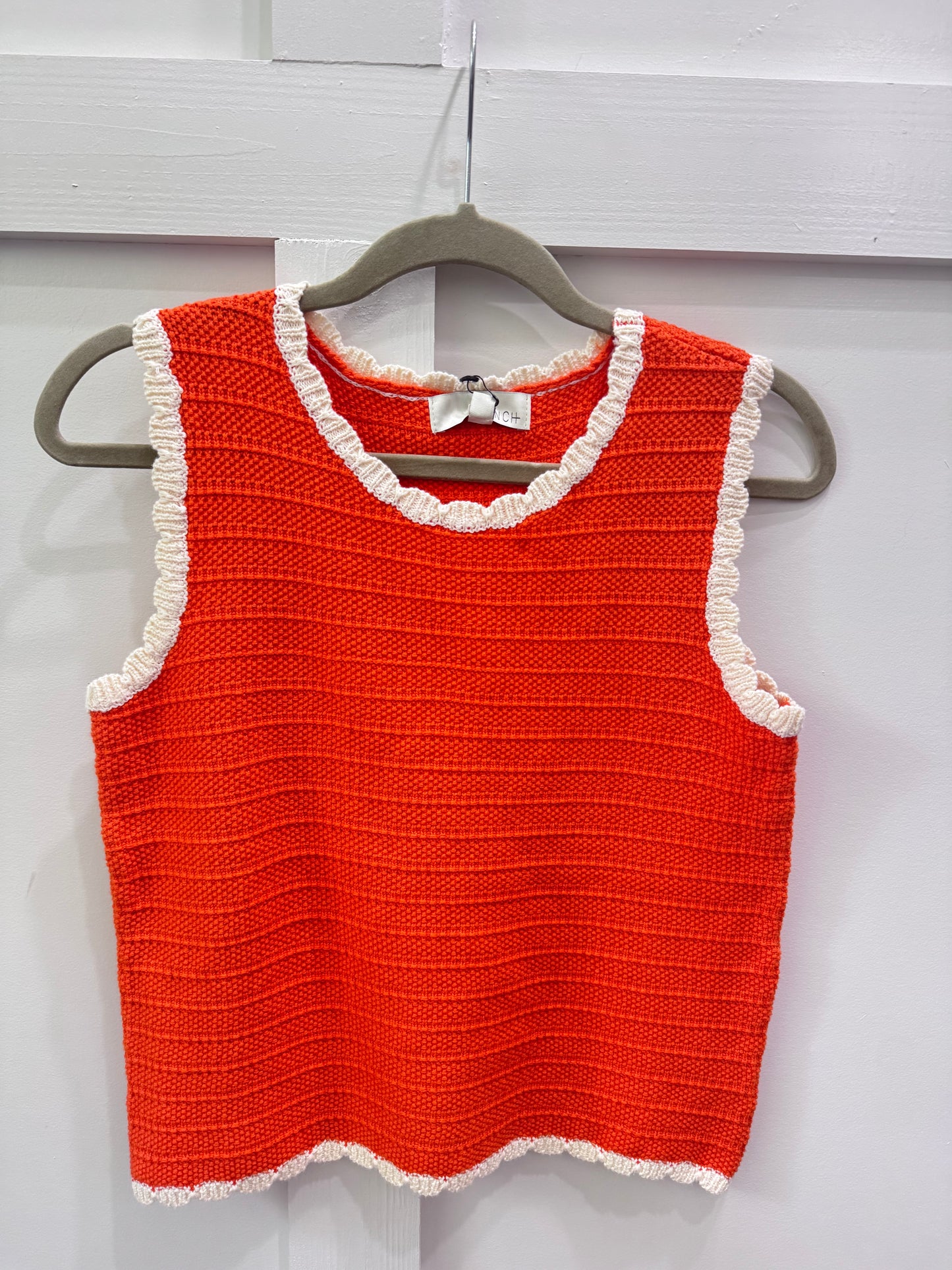 Orange cream sleeveless sweater