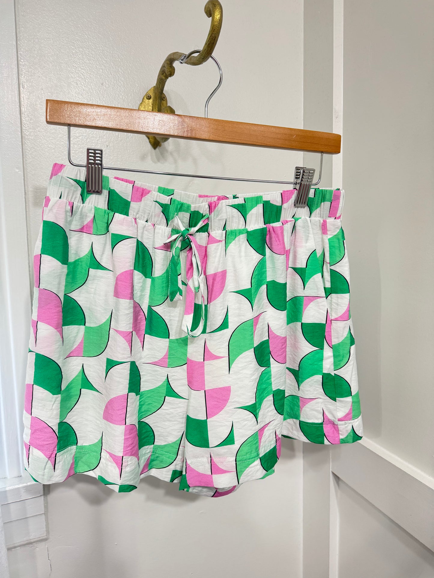 Green and pink printed shorts