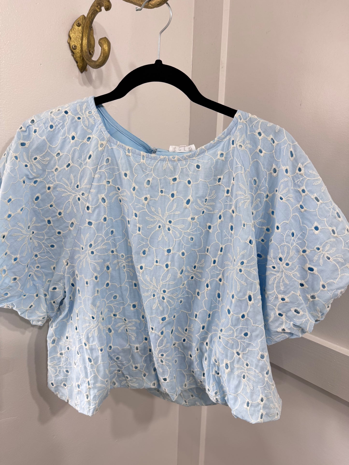 Baby blue eyelet top