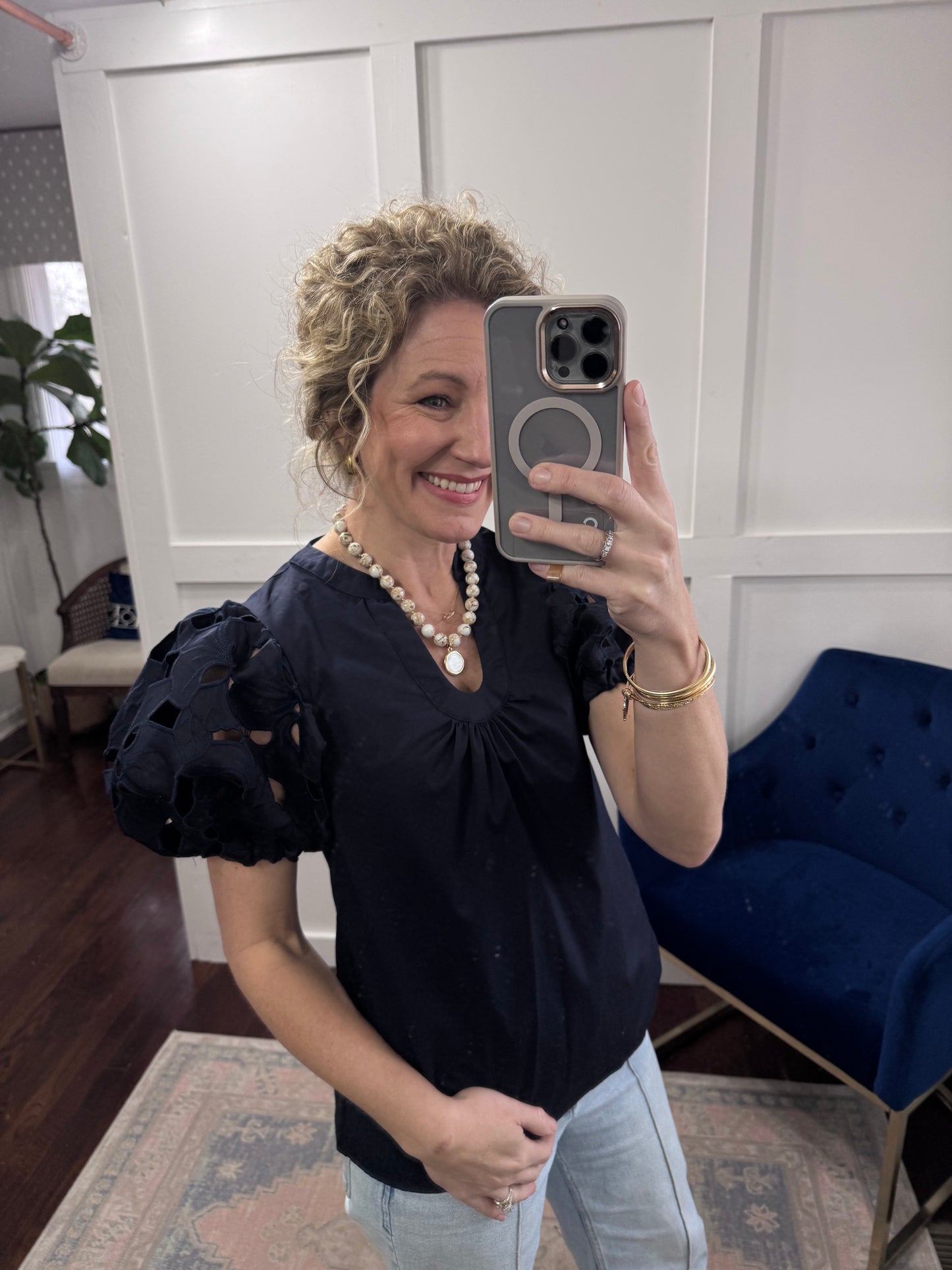 Navy eyelet puff sleeve blouse